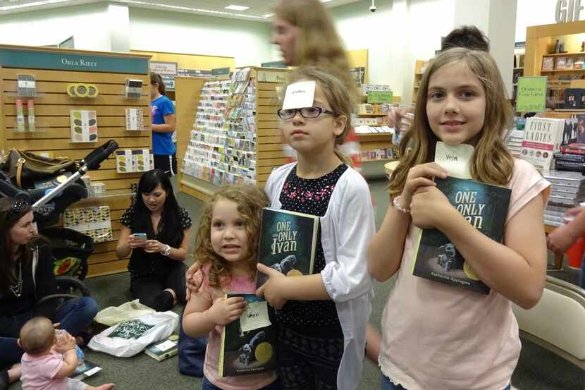  Fans of "The One and Only Ivan" wait to get their books signed by author Katherine...