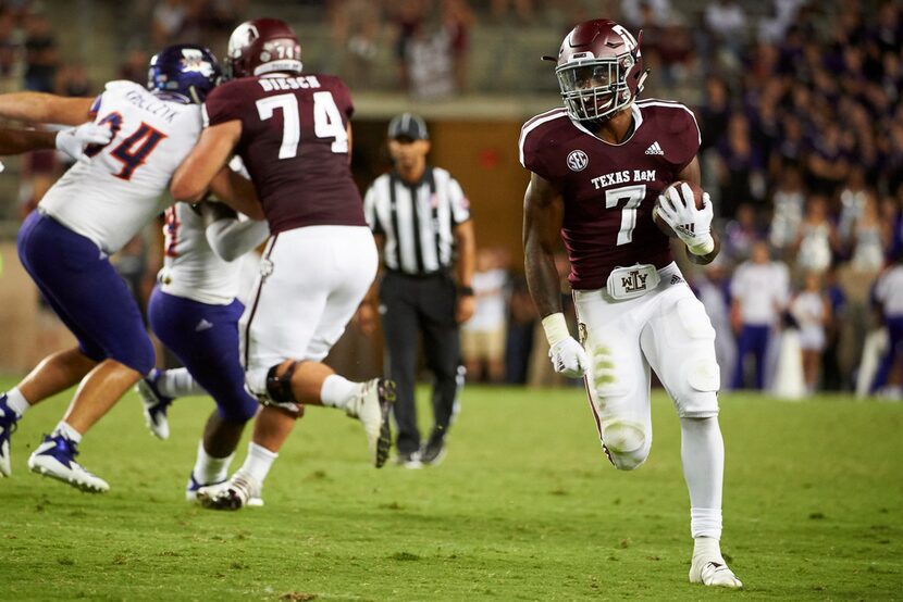 COLLEGE STATION, TX - AUGUST 30:  Jashaun Corbin #7 of the Texas A&M Aggies breaks free...