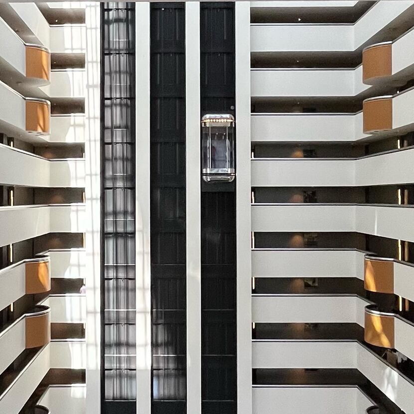Capsule elevators face the internal atrium of the Hyatt Regency.