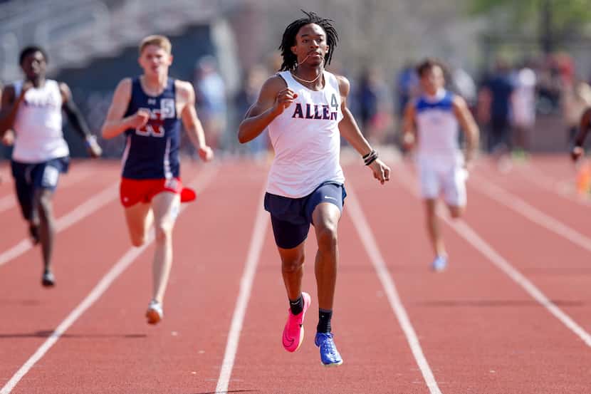 Allen’s Jonathan Simms runs the 6A boys 400 meter dash during the Jesuit-Sheaner Relays,...