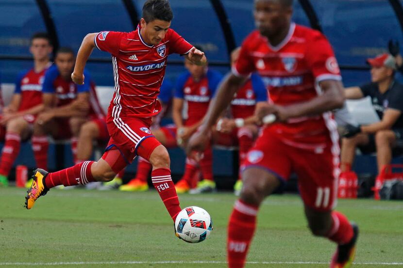 FC Dallas midfielder Mauro Diaz (10) races down the field with the soccer ball as FC Dallas...