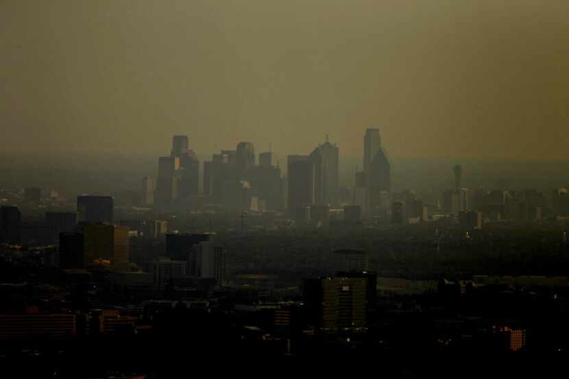 This smoggy picture of the Dallas skyline was taken seven years ago this week — quite the...