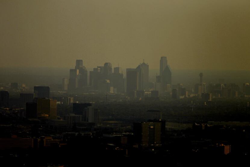This smoggy picture of the Dallas skyline was taken seven years ago this week — quite the...