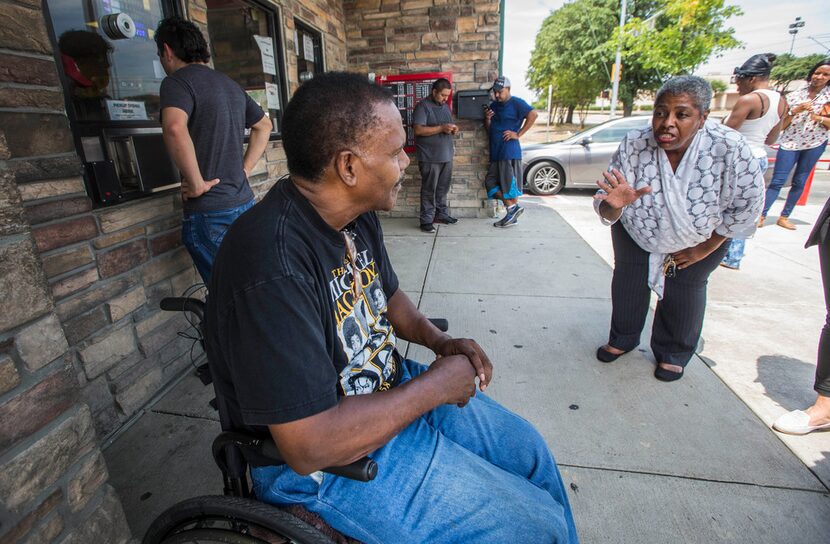 Owner Rudolph Edwards, left, is questioned on Thursday by former City Council member Sandra...