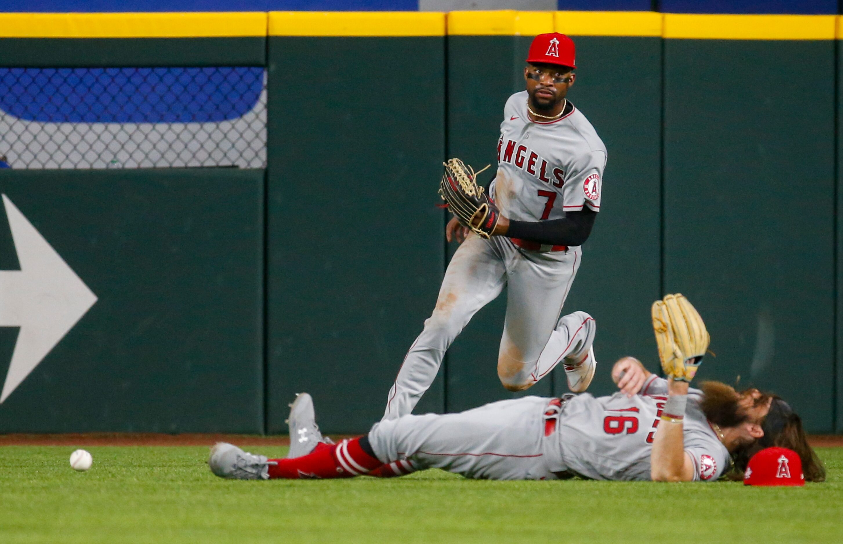 Los Angeles Angels Jo Adell’s (7) Los Angeles Angels center fielder Brandon Marsh (16) fail...