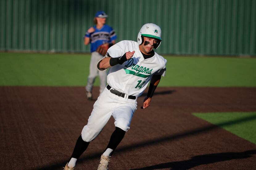 Southlake's Adam Stephenson gets a triple against Byron Nelson during the Class 6A Region I...