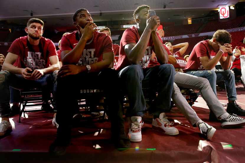 Trae Young waits for selection to start during a watch party for the NCAA selection show at...