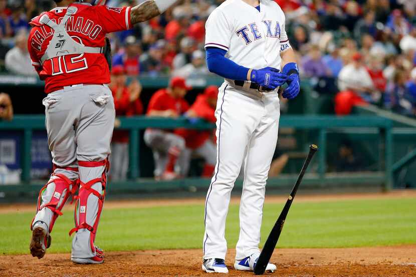 Texas Rangers left fielder Ryan Rua (16) struck out looking to end the fourth inning as Los...