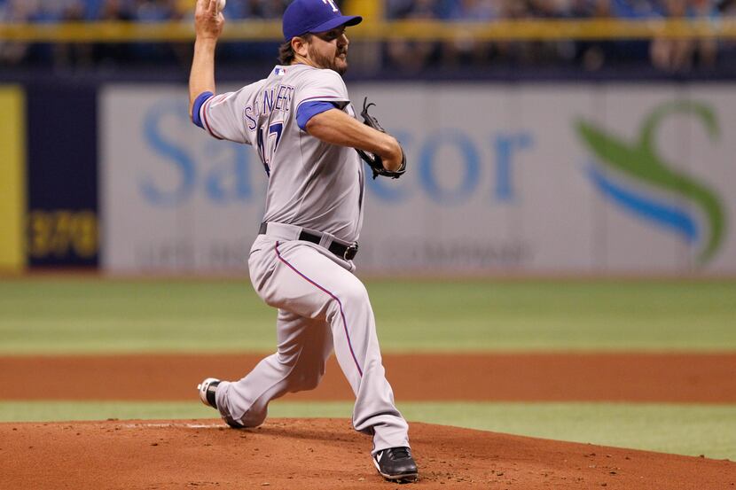 ST. PETERSBURG, FL - APRIL 4: Joe Saunders of the Texas Rangers pitches during the first...