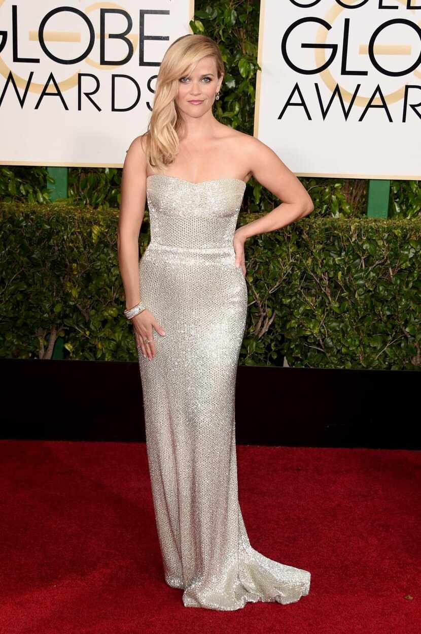 
HIT: Reese Witherspoon hit a high note in curve-hugging Calvin Klein.
