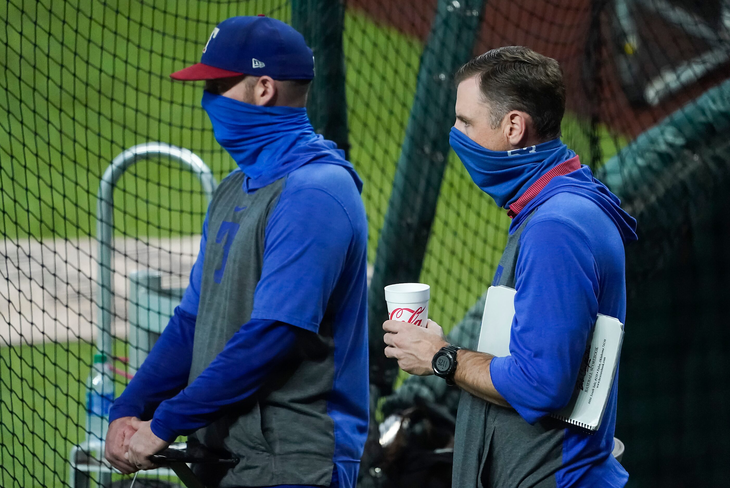 Texas Rangers assistant general manager Mike Daly (right) watches a game between players at...