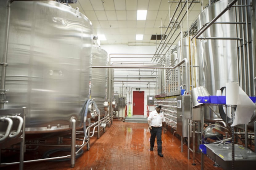 At a Dr Pepper Snapple bottling plant in Houston, Bobby Perry mixes flavors. Beverage...
