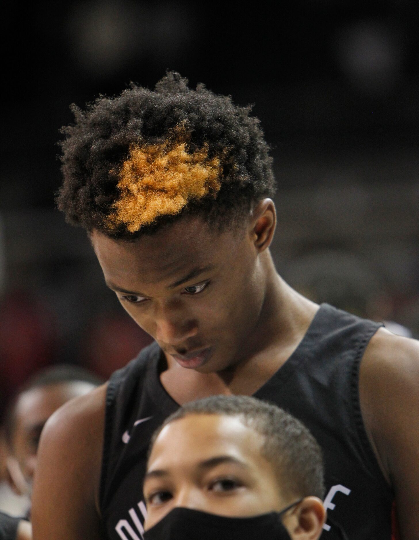 Duncanville forward Ronald Holland (1) pauses for the playing of the national anthem prior...