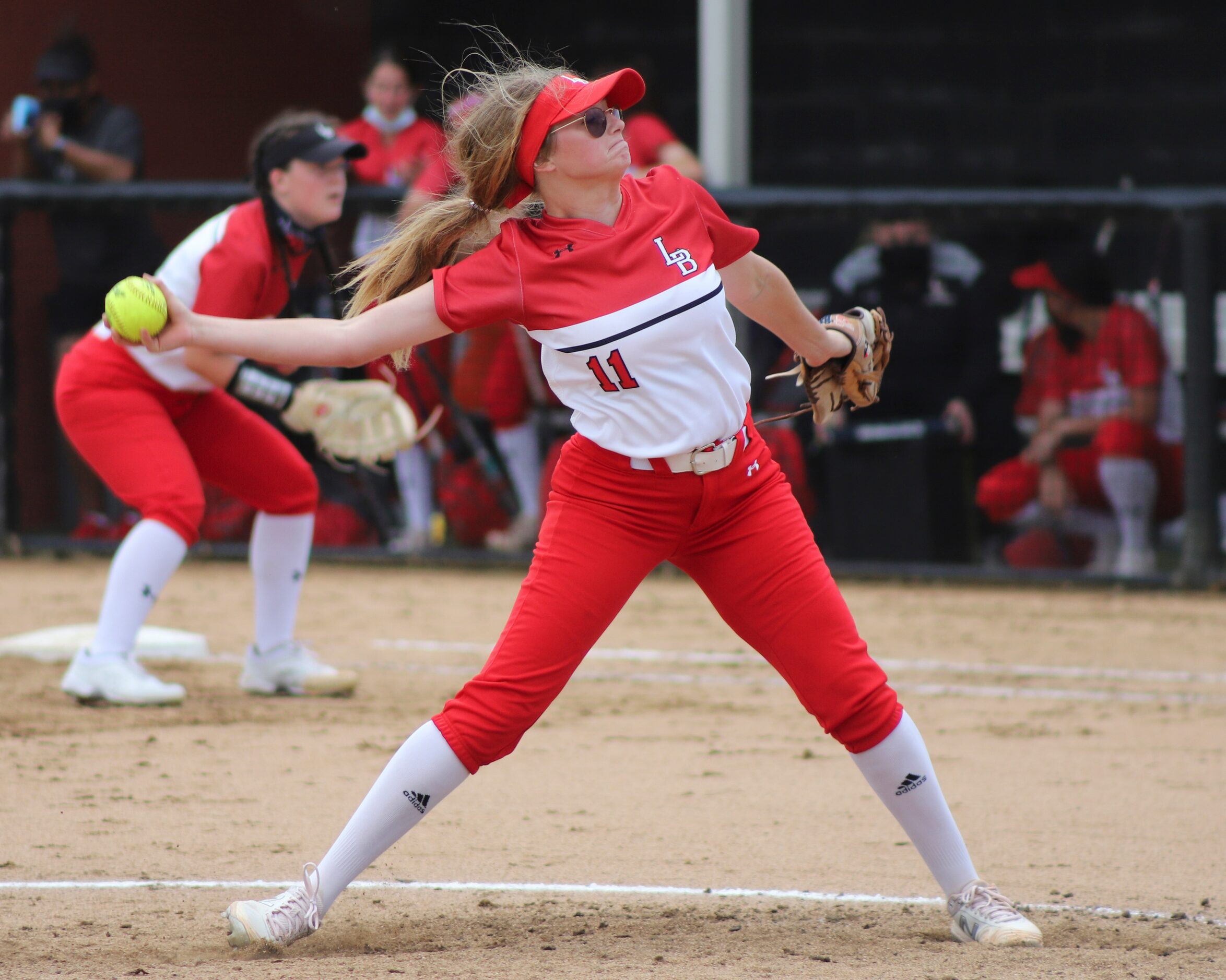 Mansfield Legacy pitcher Morgan Kolanek (11) throws a pitch during a softball Class 5A...