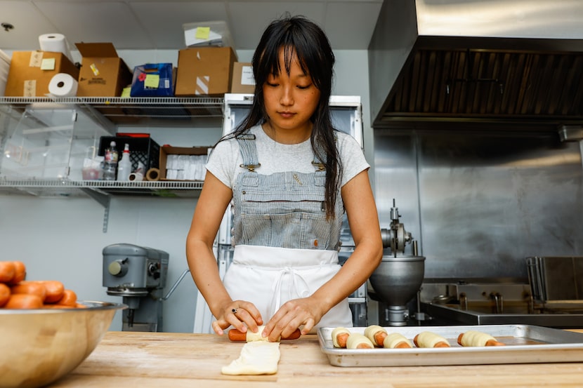 Owner Jinny Cho prepares jalapeño pigs in a blanket at Detour Doughnuts in Frisco.