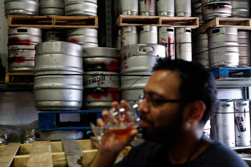 Beer here: Jay Patel sampled one of Deep Ellum Brewing Co.'s beers last May. Texas craft...
