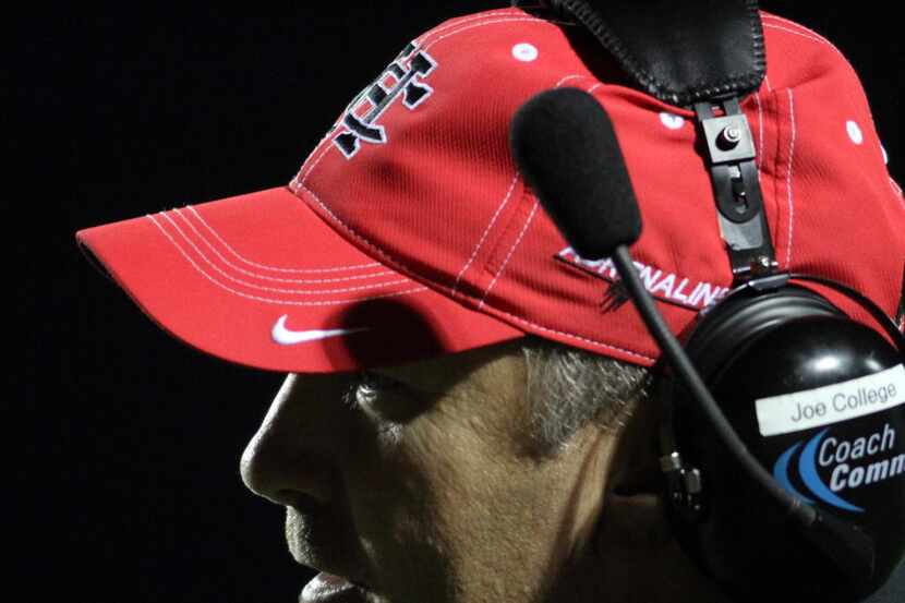 Cedar Hill Longhorns head coach Joey McGuire looks on from the team sidelines during first...