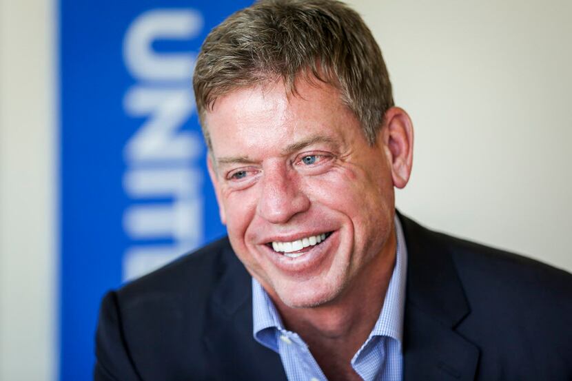 Former Cowboys quarterback and Superbowl champion Troy Aikman smiles during an interview ...