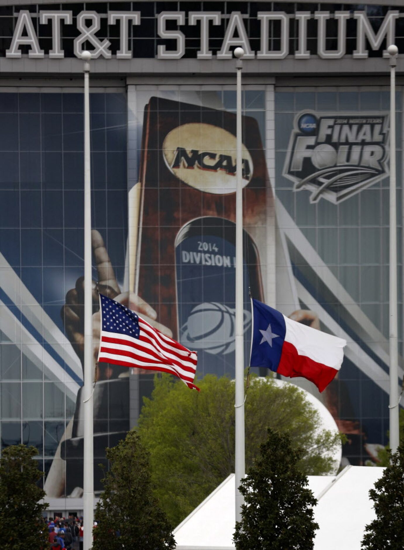 Flags outside AT&T Stadium flew at half staff for the victims of the Fort Hood shooting this...