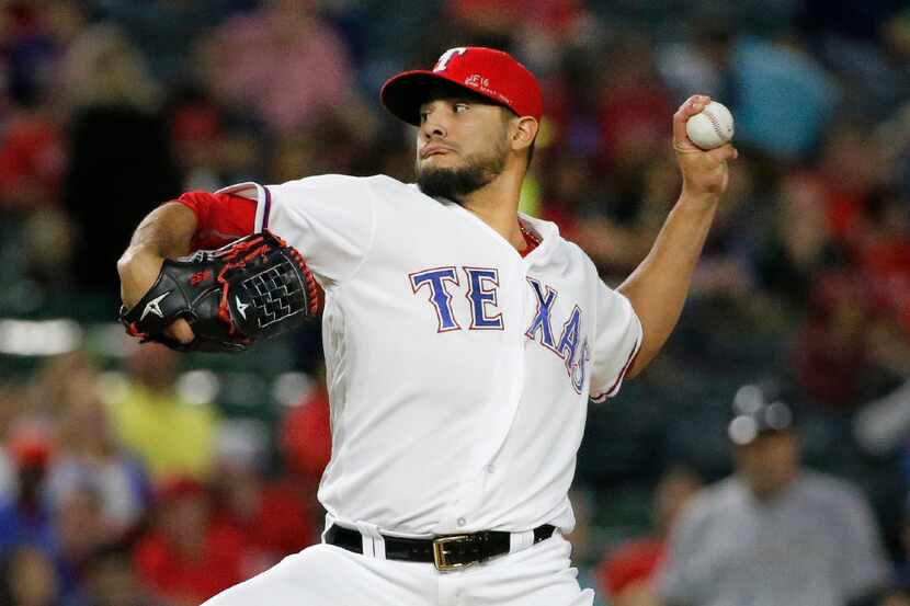 Texas Rangers starting pitcher Martin Perez (33) is pictured during the Milwaukee Brewers...