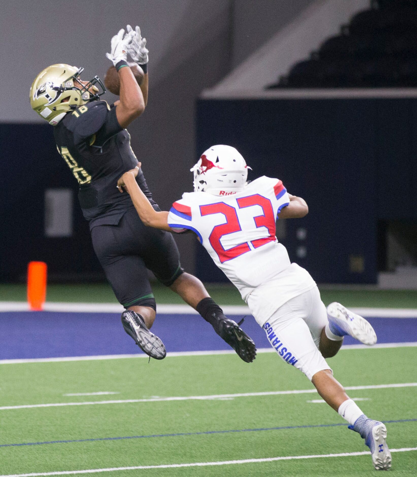 Birdville wide receiver Carter Self (18) as misses a pass as Grapevine defensive back...