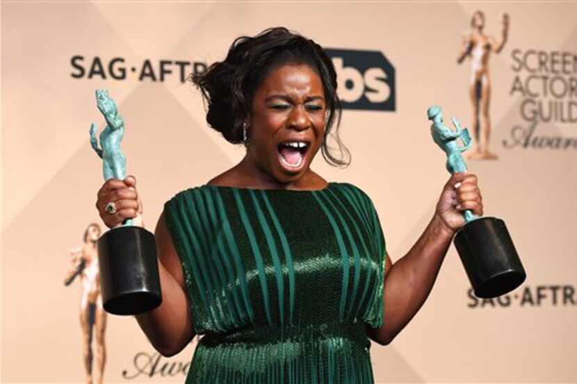 Uzo Aduba poses in the press room at the 22nd annual Screen Actors Guild Awards at the...