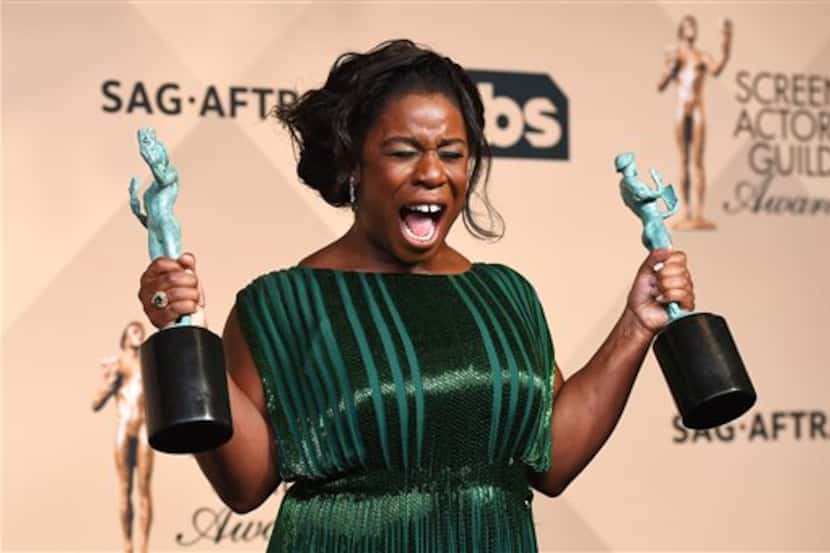 Uzo Aduba poses in the press room at the 22nd annual Screen Actors Guild Awards at the...