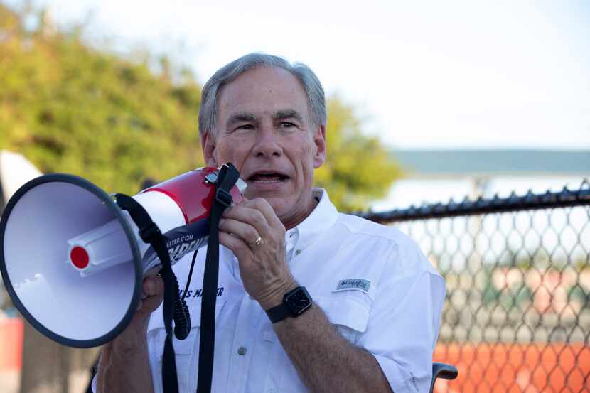 Gov. Greg Abbott hosts a tailgate at a First Dallas Academy football game at First Baptist...