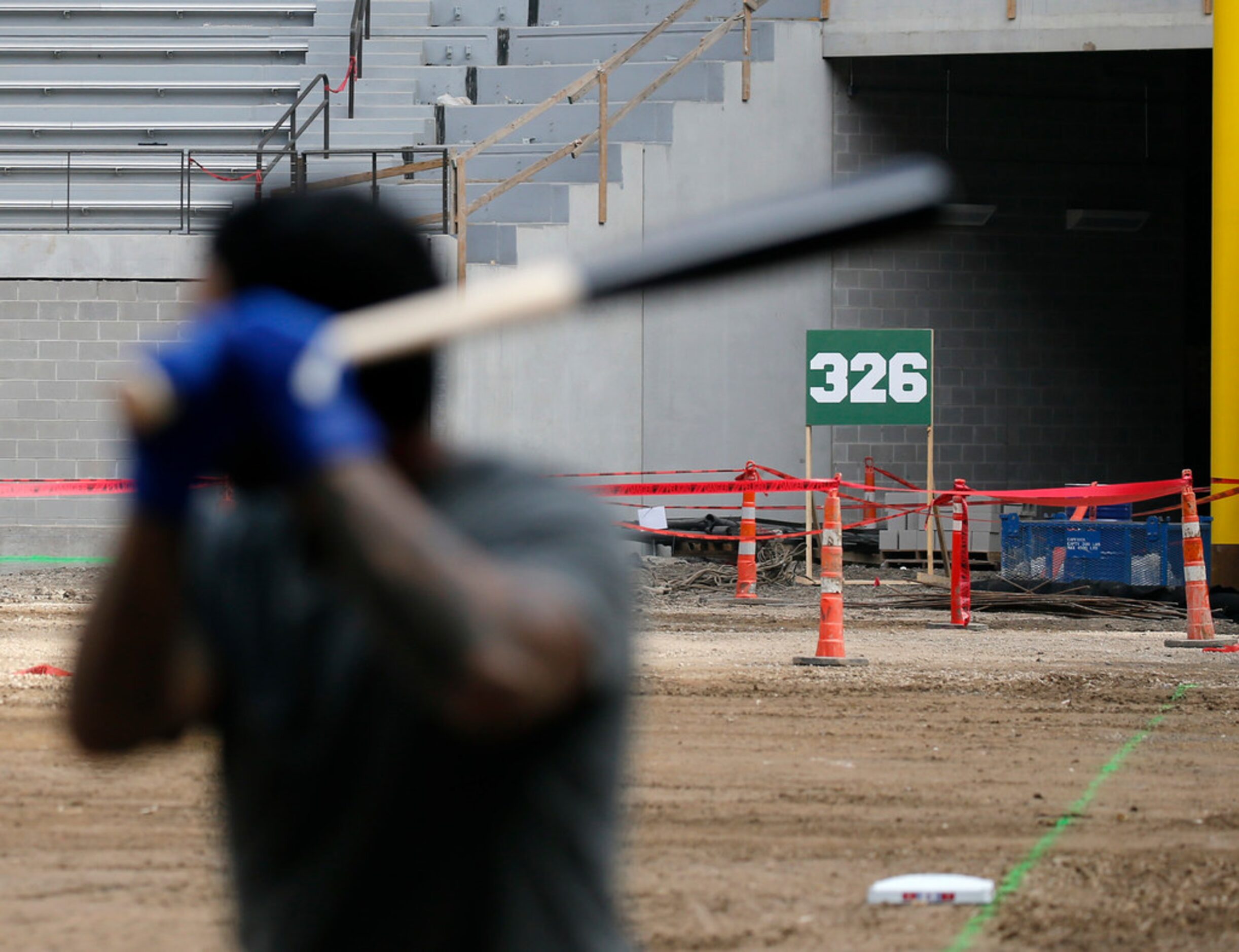 Texas Rangers Willie Calhoun prepares to hit the ball as you can see the 326 feet line for...