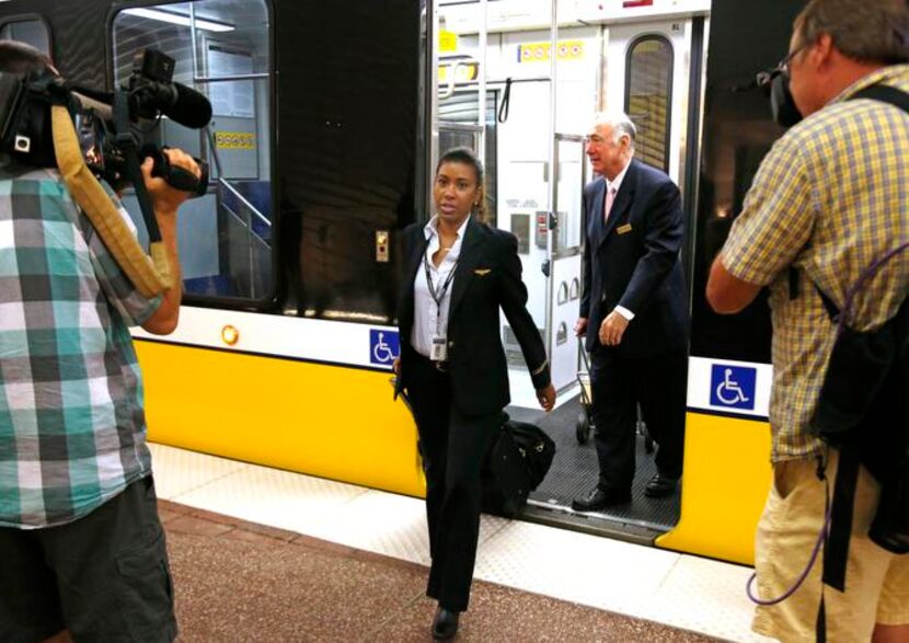 
American Airlines employees arrived at Terminal C at D/FW after taking DART’s Orange Line...