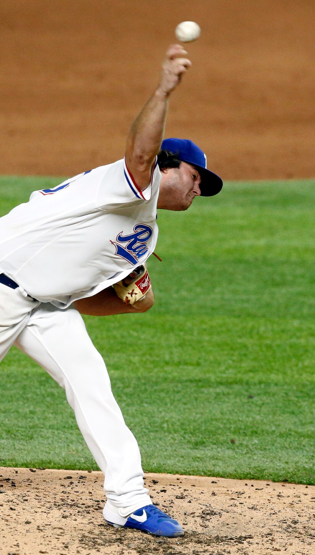 Texas Rangers relief pitcher Ian Gibaut (63) throws against the Arizona Diamondbacks during...