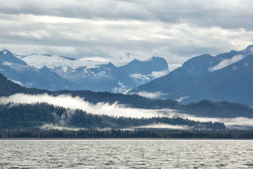 Low-hanging clouds and fog often shroud the mountains and forests of the Inside Passage.
