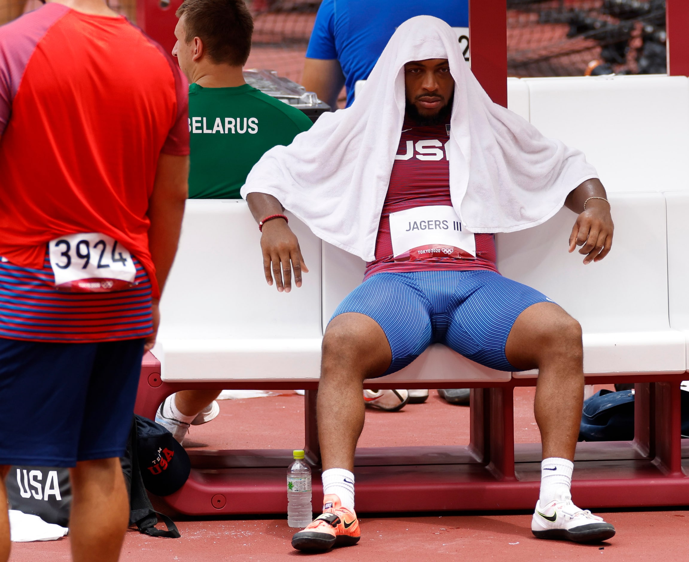 USA’s Reggie Jagers III sits dejected on the bench after not qualifying for the next round...