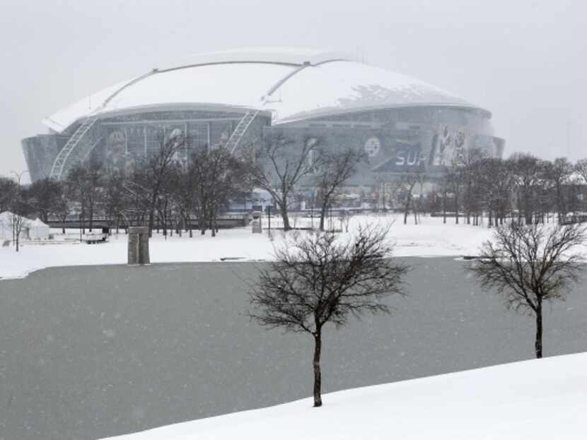 FILE — The park around Mark Holtz Lake and Cowboys Stadium, site of Super Bowl XLV, were...
