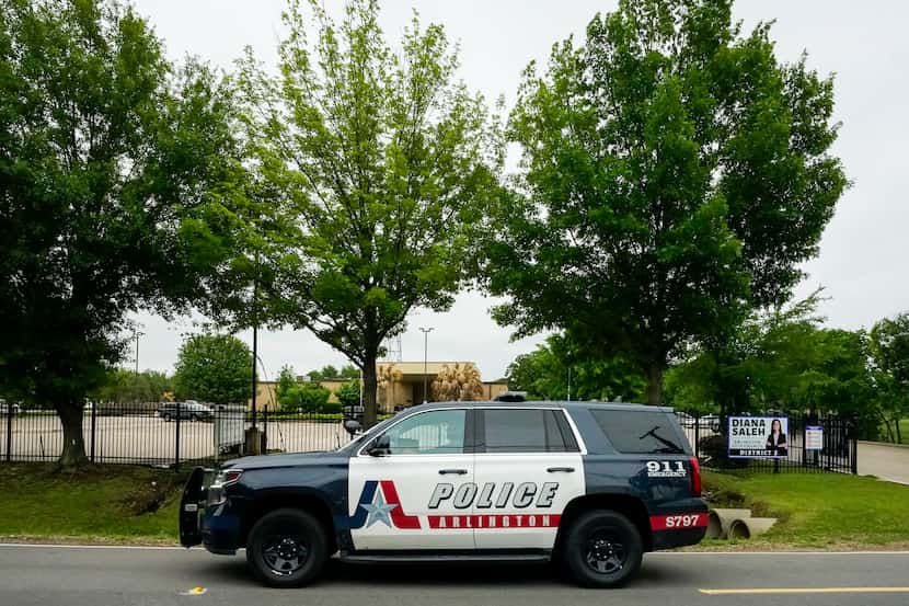 An Arlington police vehicle passed the Dar El-Eman Islamic Center on Mansfield Road on...