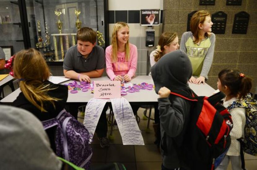 
Fifth-grade students (from left) Conner Craig, Maddie Cheek, Grace Staten and Haley Mathews...