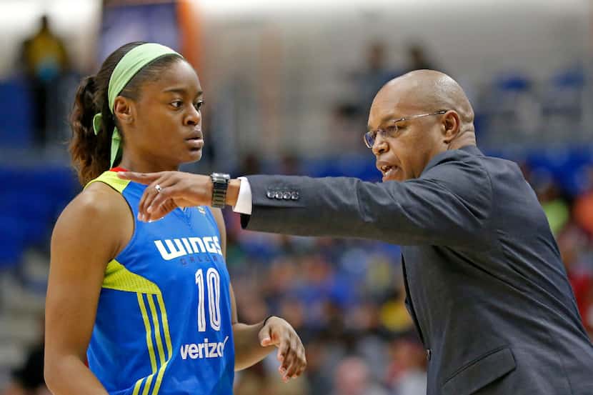 Dallas Wings Head Coach Fred Williams (right) talks with his player guard Kaela Davis during...