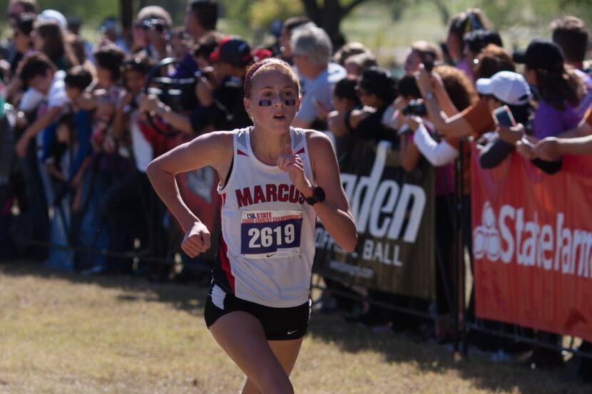Former Flower Mound Marcus runner Madeleine Reed, shown competing at the 2014 UIL cross...