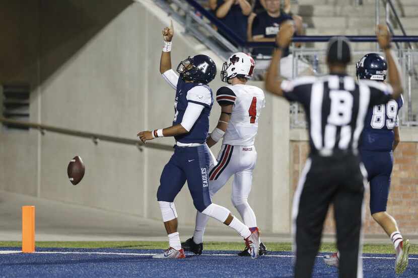 Allen's Seth Green (7) celebrates after rushing for a 75 yard touchdown in a game against...