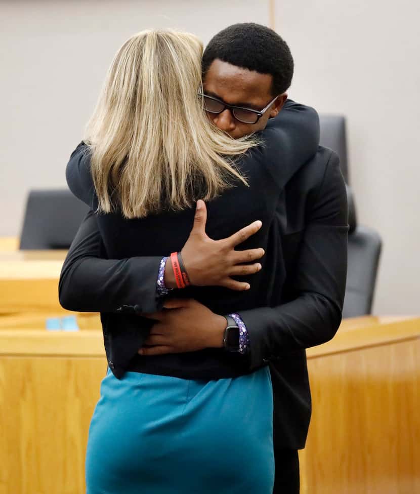 The embrace Brandt Jean shared with his brother's killer, Amber Guyger,  came during his...