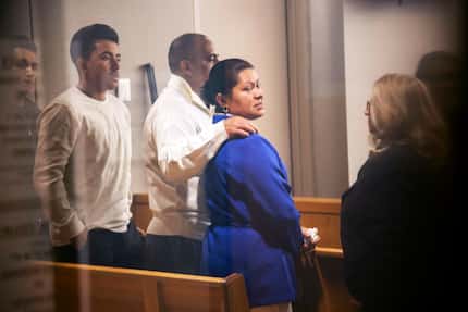 Ernestina Valadez, center, is held by her husband after testifying in the trial of Lisa...
