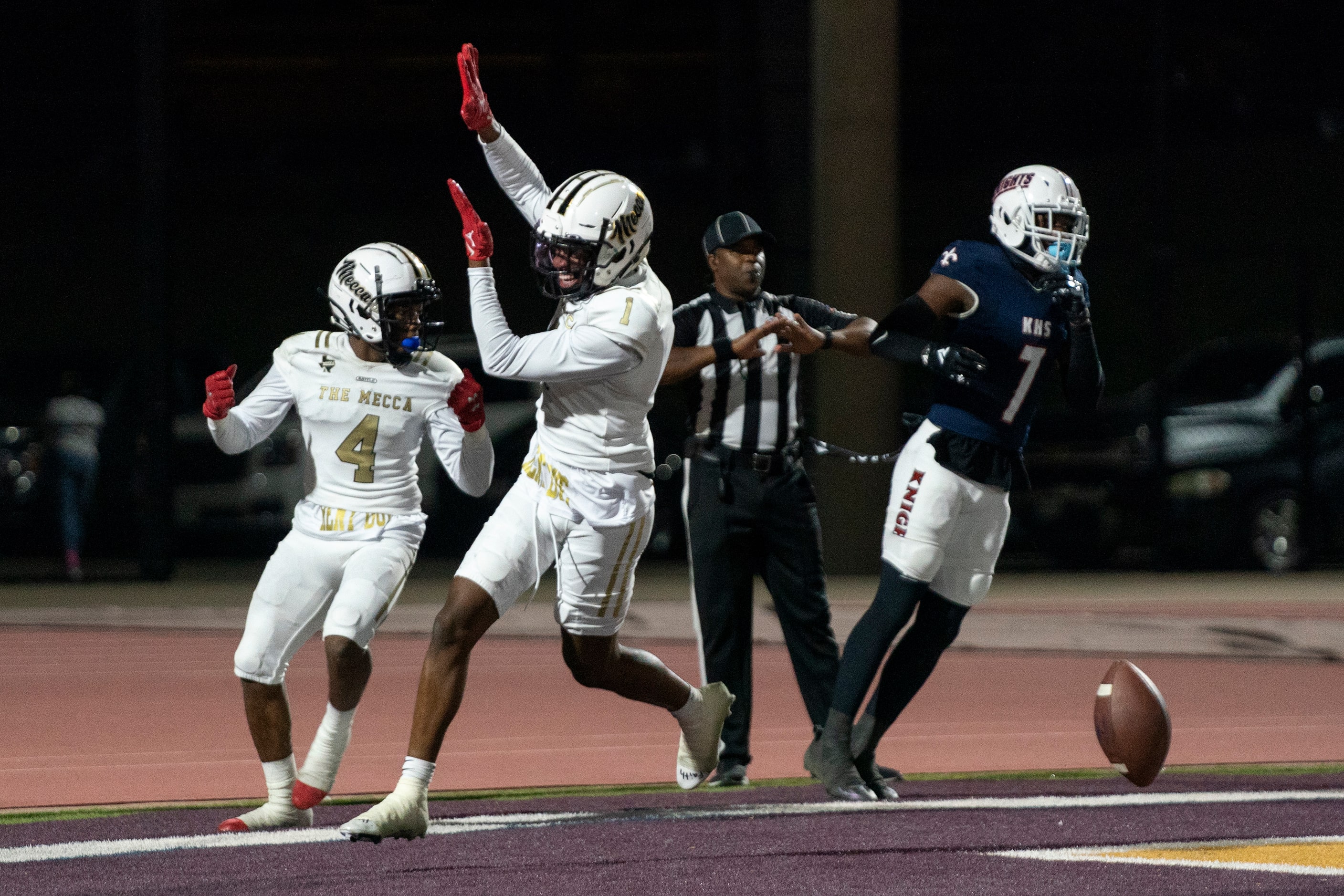 South Oak Cliff senior defensive backs Manny Muhammad (1) and David Spruiells (4) celebrate...