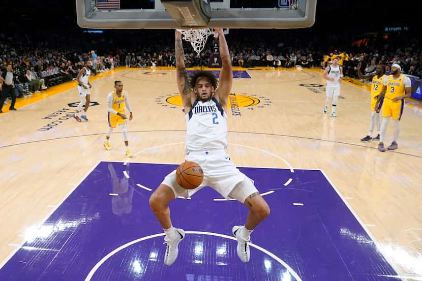 Dallas Mavericks center Dereck Lively II dunks against the Los Angeles Lakers during the...