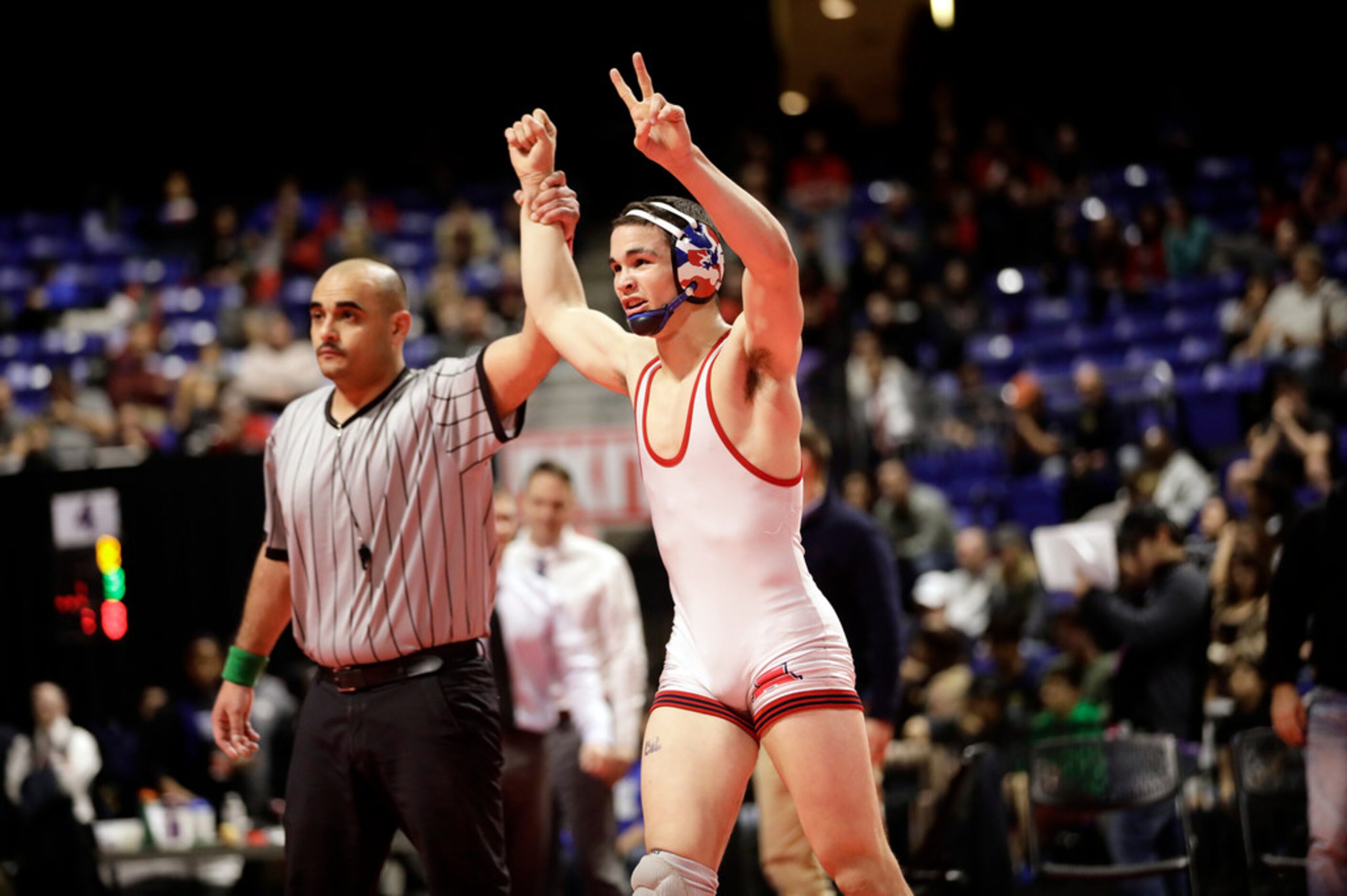 Mario Danzi of Allen wrestles during the UIL Texas State Wrestling Championships, Saturday,...