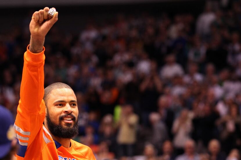 Mar 6, 2012; Dallas, TX, USA; New York Knicks center Tyson Chandler holds up his...