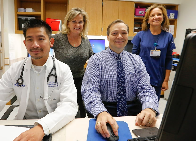 Kim Ludwig (second from left) depends on two health teams to fight multiple myeloma. At UT...