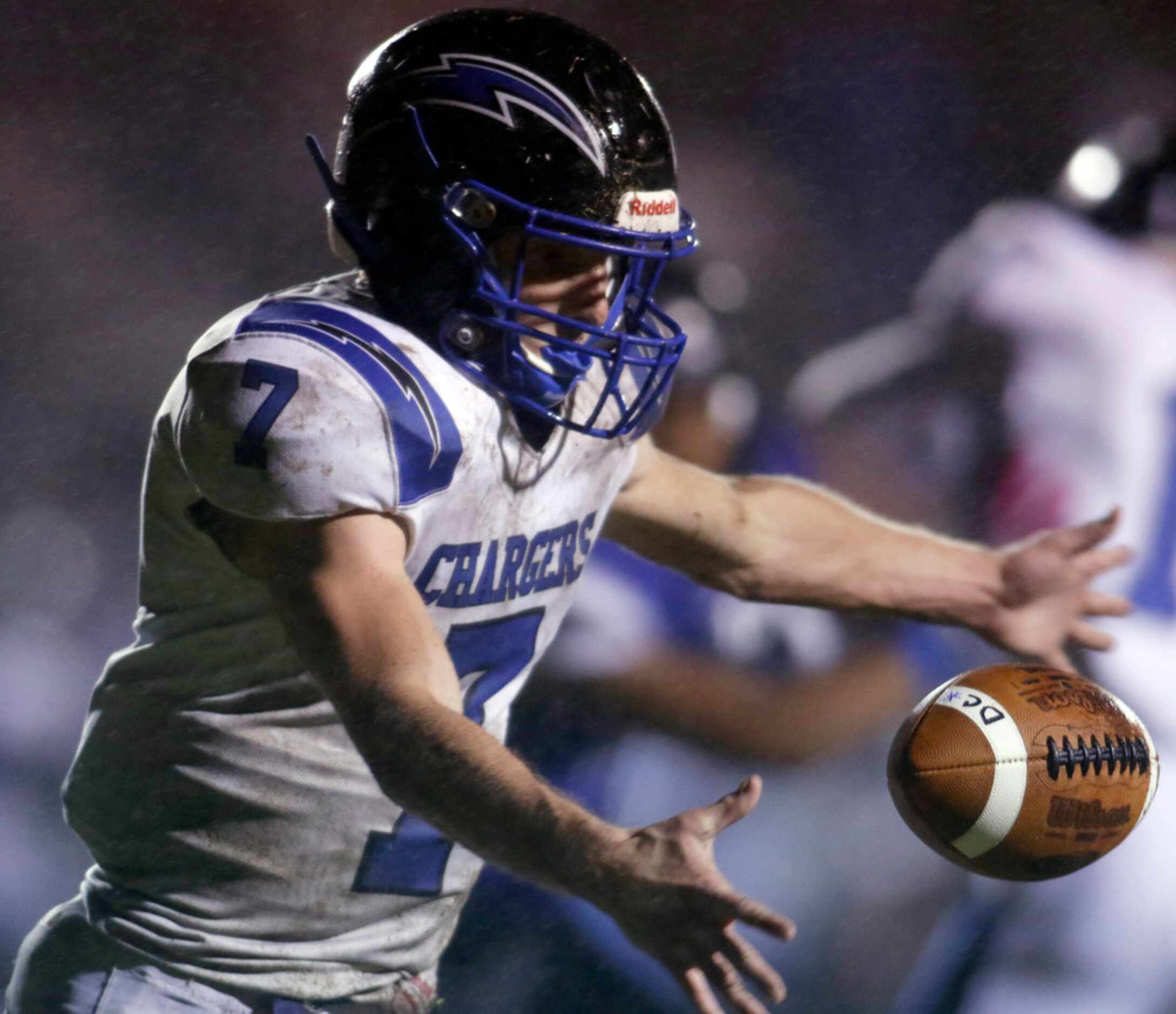 Dallas Christian punter TJ King (7) punts to Trinity Christian-Cedar Hill during the first...