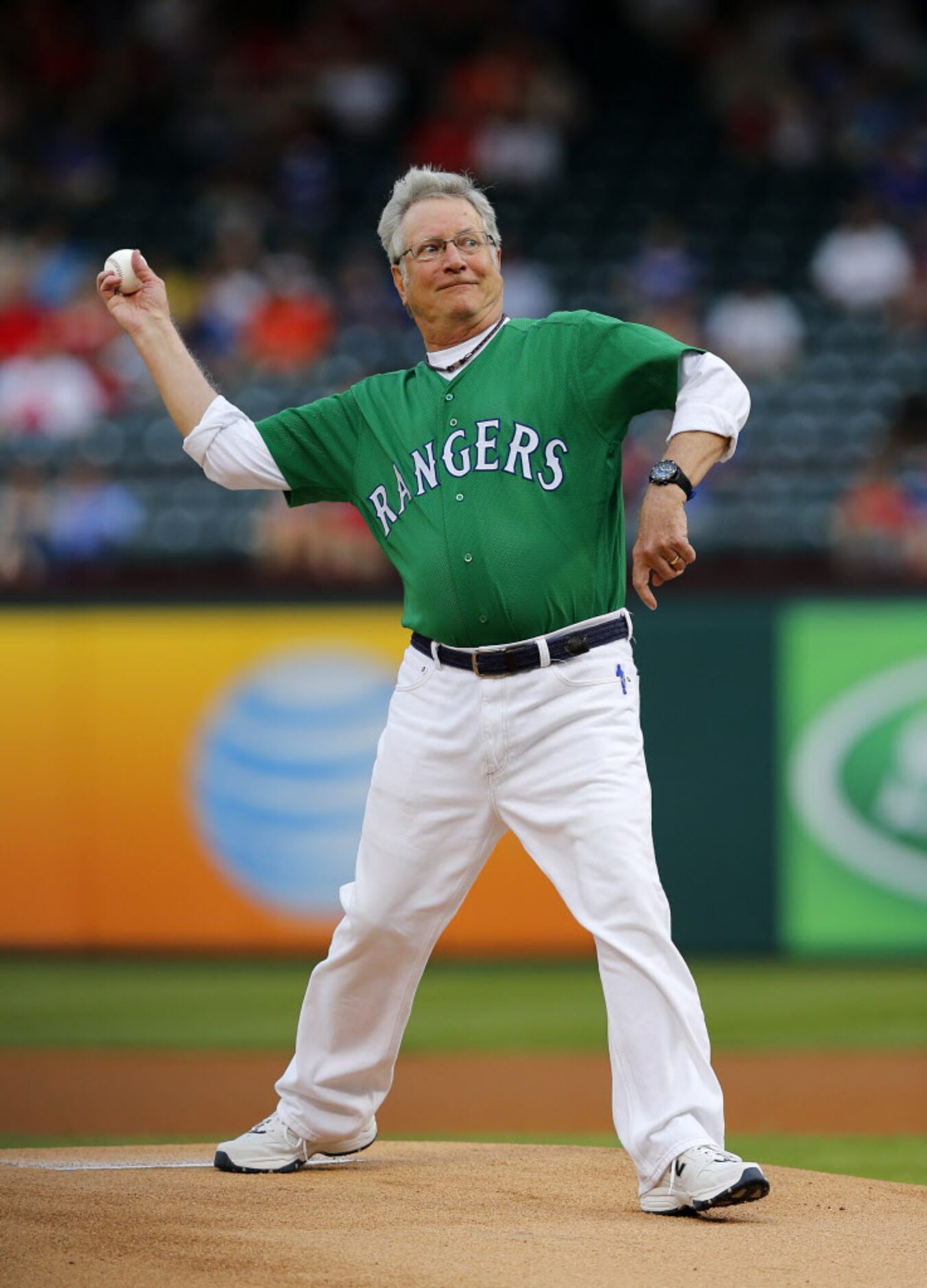 Former Arlington Mayor Richard Greene threw out the ceremonial first pitch before the Texas...