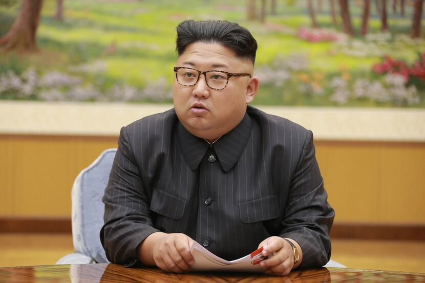Kim Jong Un, shown at a Sept. 3 meeting, has traded threats with President Donald Trump....