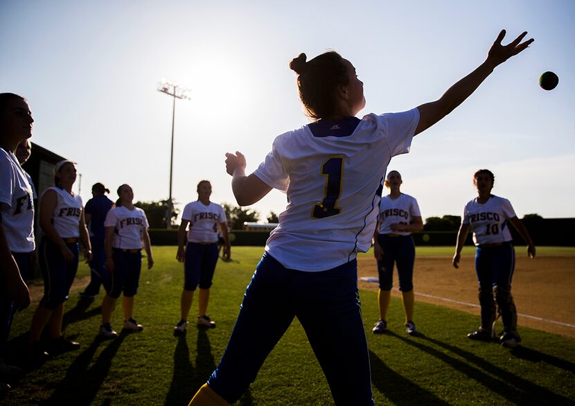  Frisco's Abby Sheehy (1) reaches to catch a hacky sack while hear team plays together...